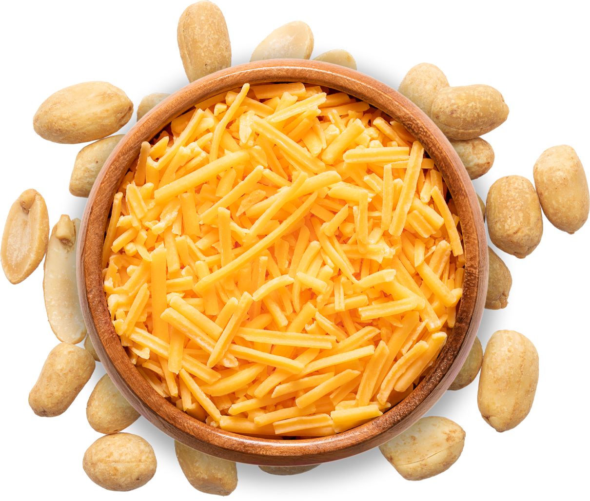 Geriebener Cheddar in einer Schale mit Nüssen außenherum.